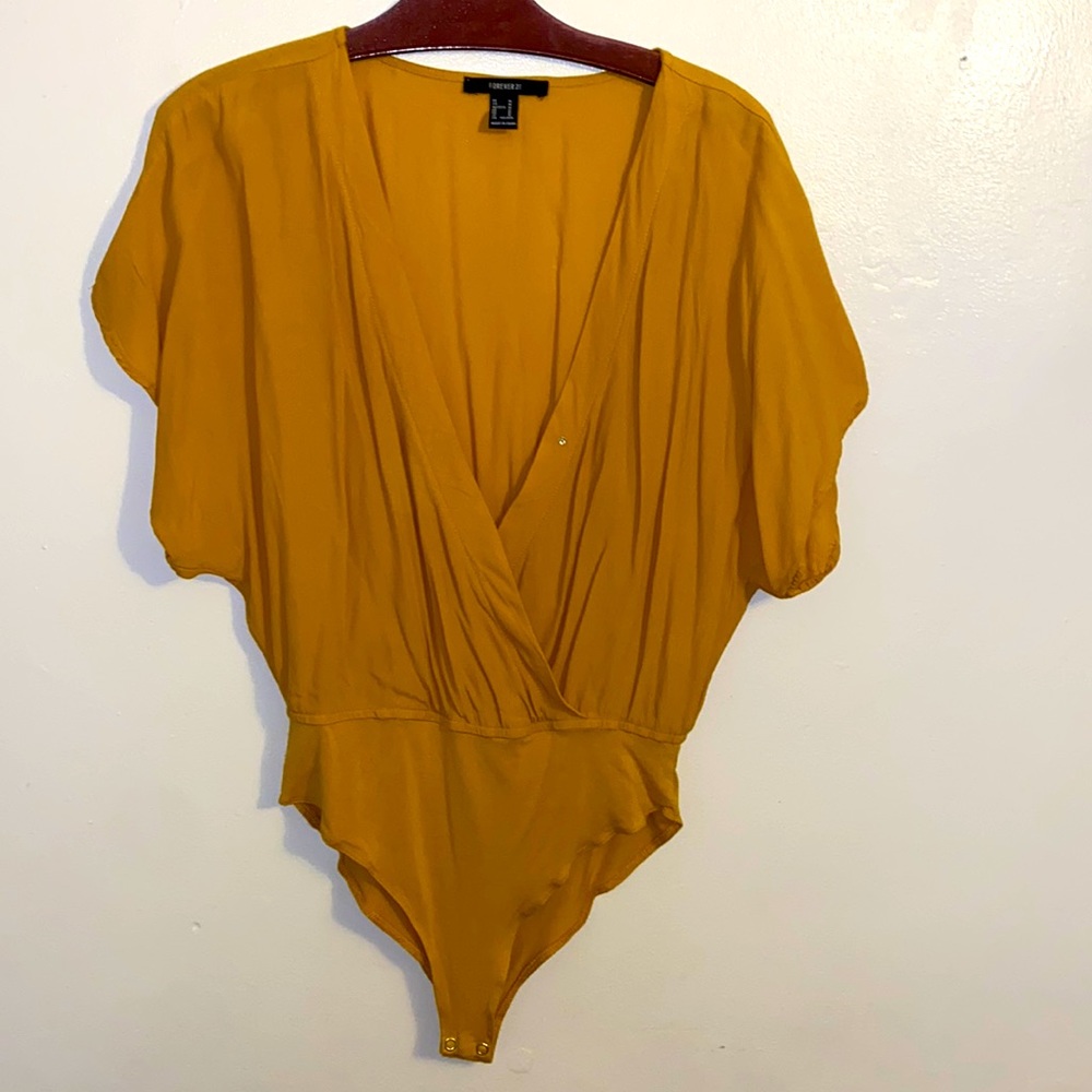 Lovely gold color bodysuit!